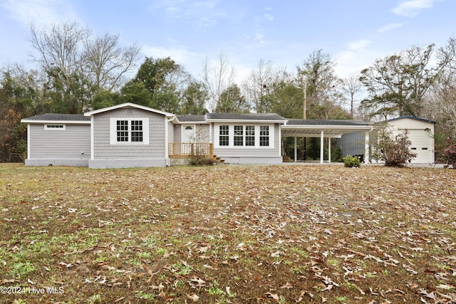 rear view of house with a carport