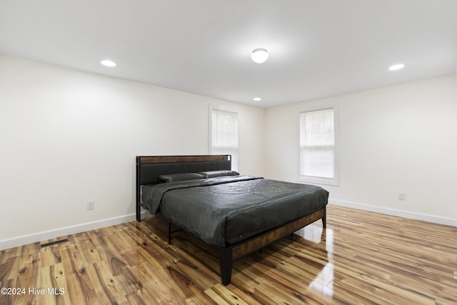 bedroom featuring hardwood / wood-style flooring