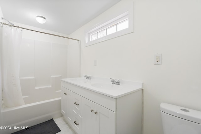 full bathroom featuring tile patterned floors, vanity, toilet, and shower / bathtub combination with curtain