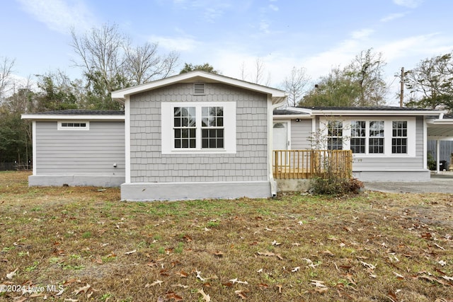 exterior space featuring a lawn