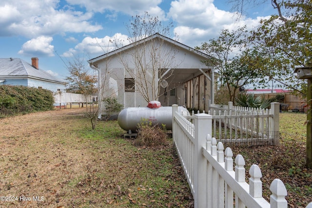 view of home's exterior featuring a sunroom