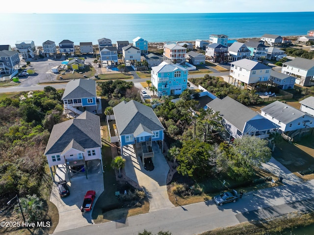 aerial view featuring a residential view and a water view
