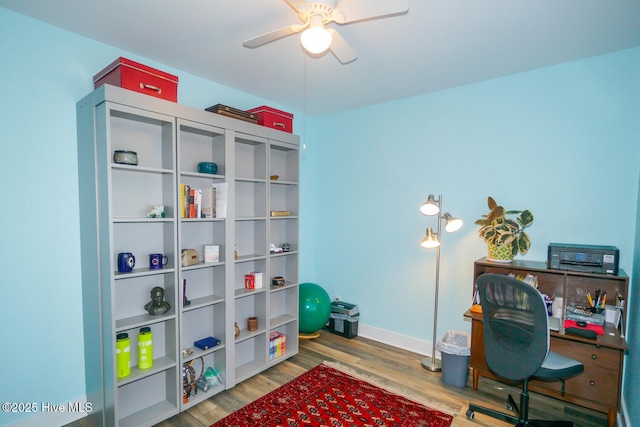 office area with ceiling fan and wood-type flooring