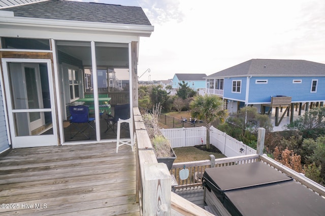 deck featuring a sunroom