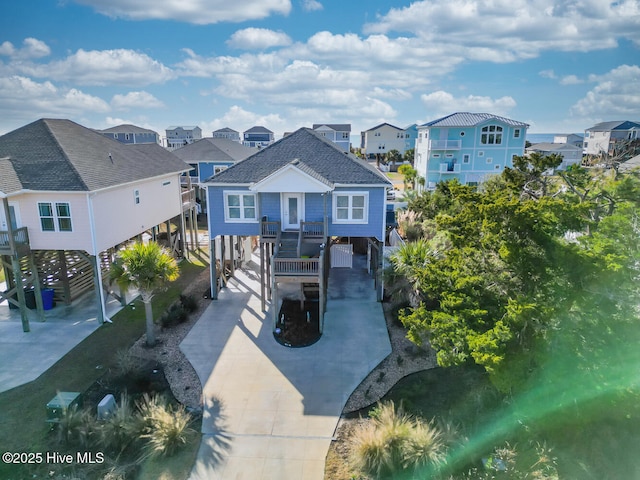 view of front of home with a carport