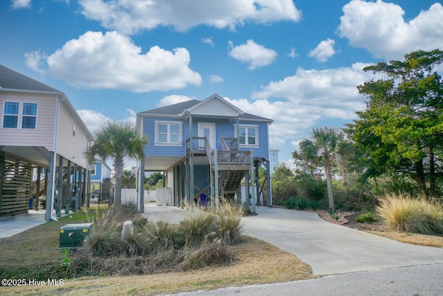 coastal home featuring a carport