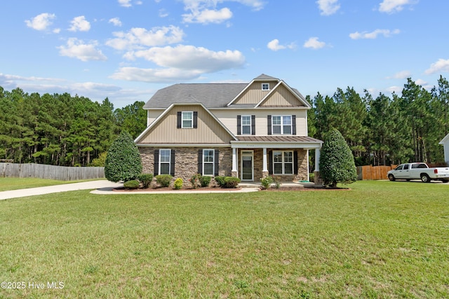 craftsman-style home featuring a front yard