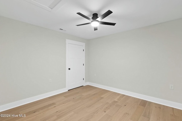 unfurnished room featuring ceiling fan and light wood-type flooring