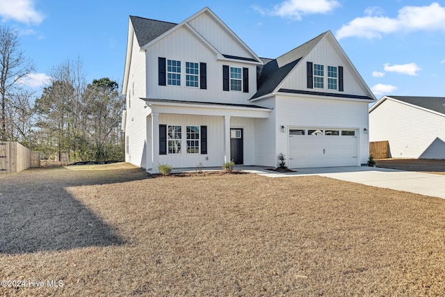 view of front of property with a garage