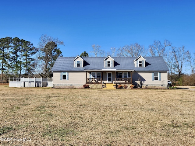 view of front facade with a porch and a front yard