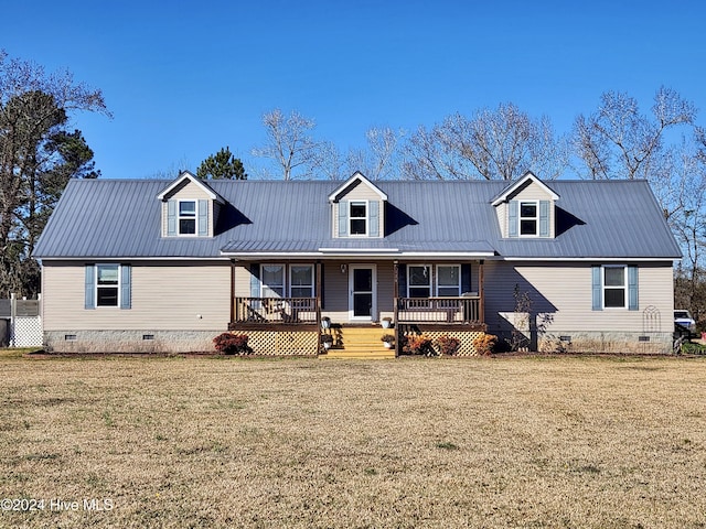 cape cod house featuring a front yard and a porch