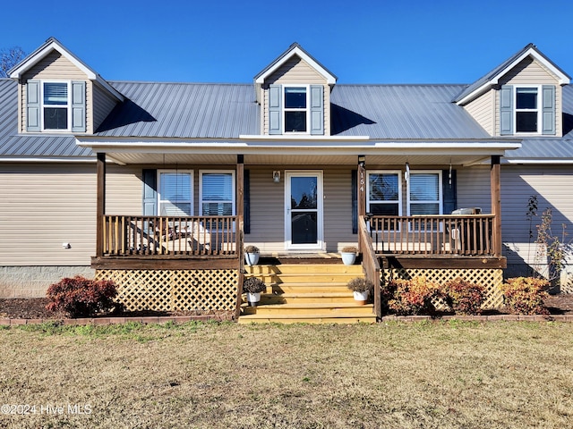 view of front of house featuring a porch and a front yard