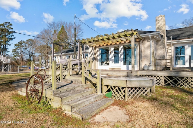 exterior space with a pergola and a deck