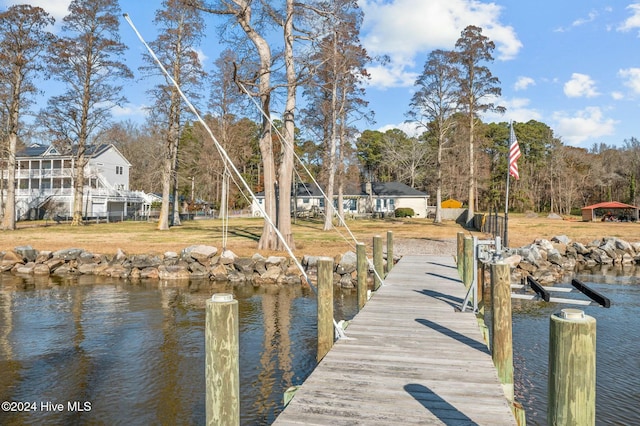 view of dock with a water view