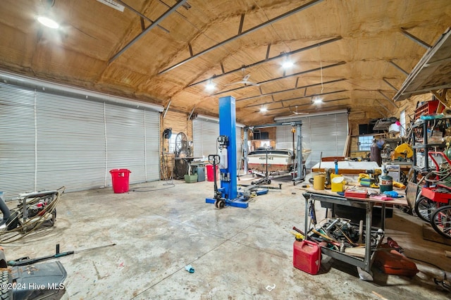 garage with a workshop area