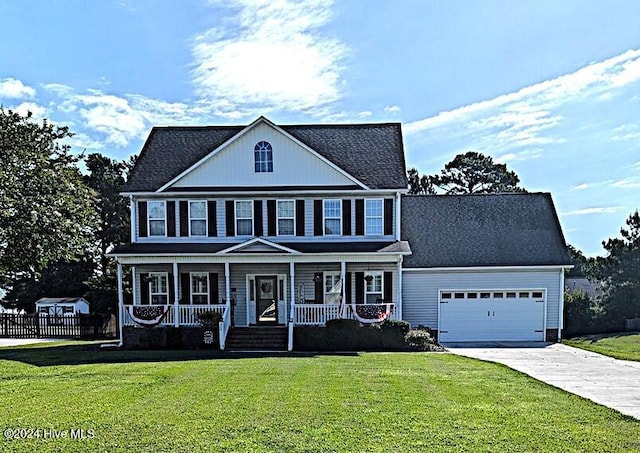 526 Rock Creek Dr N, Jacksonville, NC 28540 - colonial inspired home featuring concrete driveway, covered porch, an attached garage, and a shingled roof