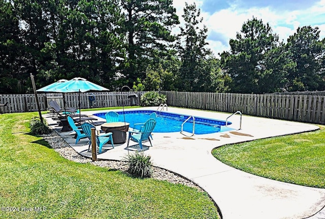 526 Rock Creek Dr N, Jacksonville, NC 28540 - view of pool with a patio and view of scattered trees