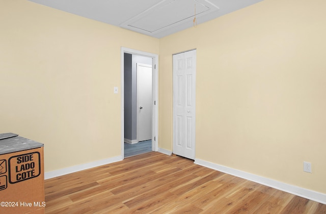 unfurnished room featuring light hardwood / wood-style flooring