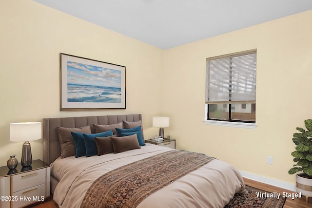 bedroom featuring wood-type flooring