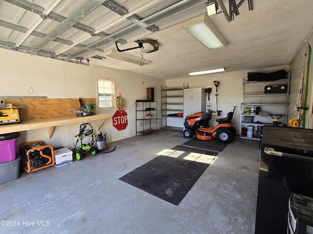 garage with a workshop area