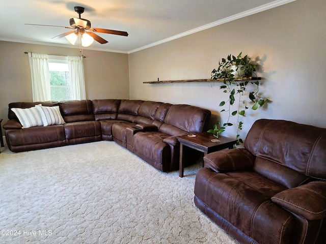 carpeted living room with ceiling fan and ornamental molding