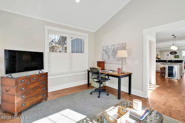 home office featuring wooden ceiling, wood-type flooring, and lofted ceiling