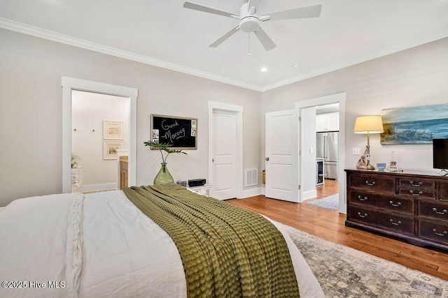 bedroom with ensuite bathroom, ceiling fan, light wood-type flooring, ornamental molding, and high end fridge