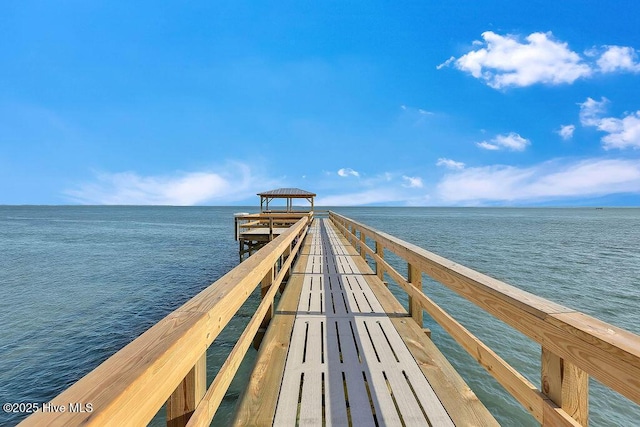 dock area featuring a gazebo and a water view