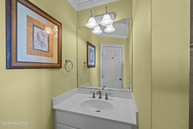 bathroom featuring vanity and ornamental molding