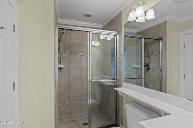 bathroom with walk in shower, toilet, and ornamental molding