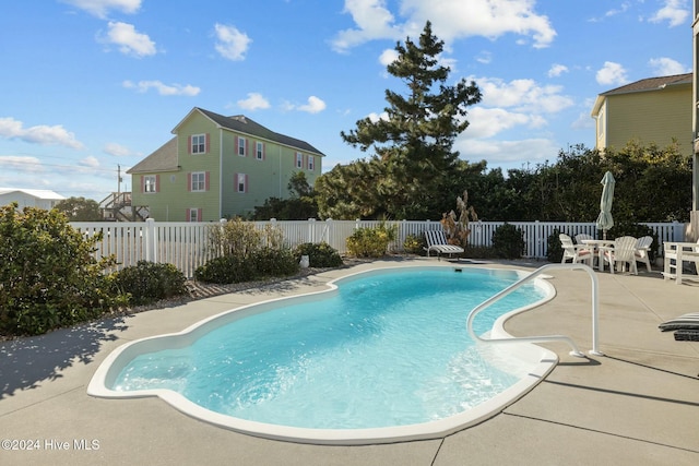 view of pool with a patio area