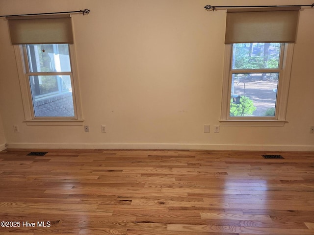 7 Brinyan Ct, Pinehurst, NC 28374 - spare room with wood finished floors and baseboards