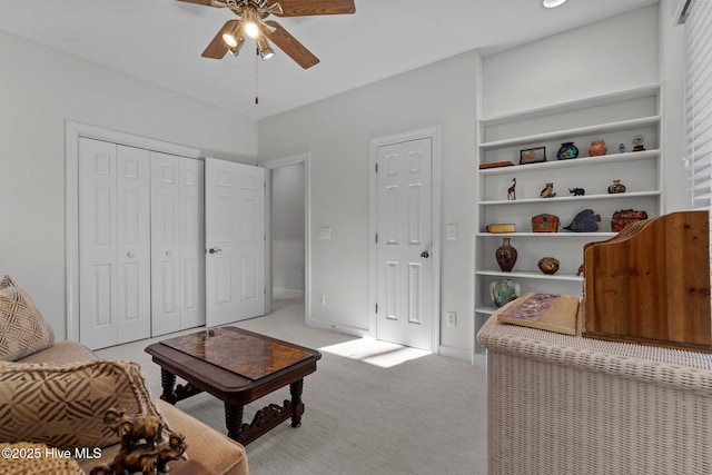 7 Brinyan Ct, Pinehurst, NC 28374 - living room featuring a ceiling fan, light carpet, and baseboards