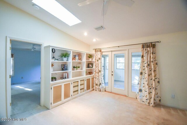 dining room with light colored carpet and sink