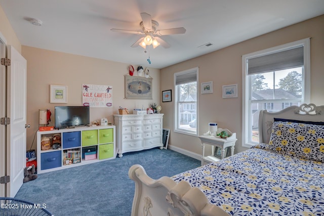 carpeted bedroom with ceiling fan