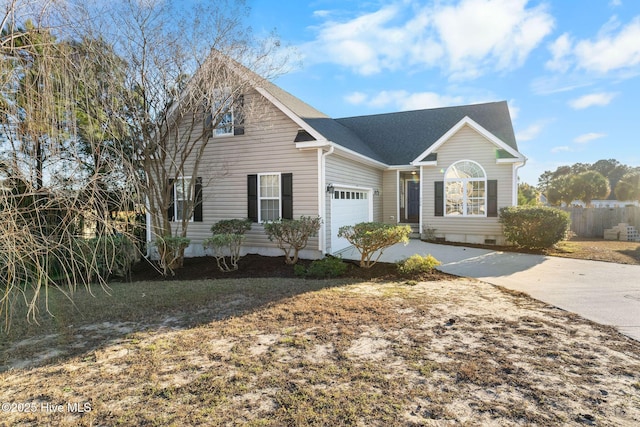 front of property with a garage