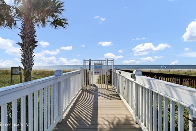 surrounding community featuring a water view