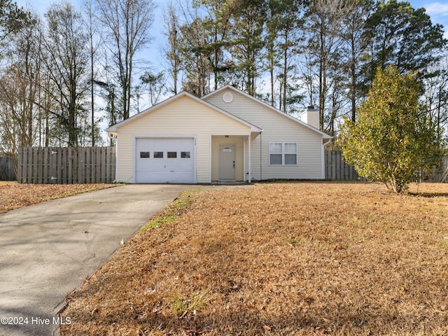 ranch-style home featuring a garage