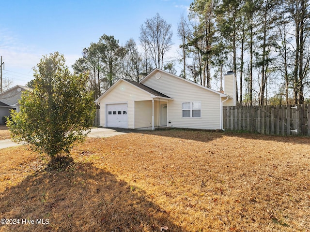 single story home featuring a garage