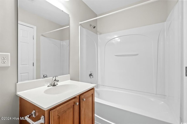 bathroom with vanity and tub / shower combination