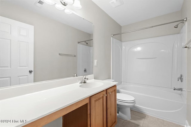 full bathroom featuring tile patterned flooring, vanity, washtub / shower combination, and toilet