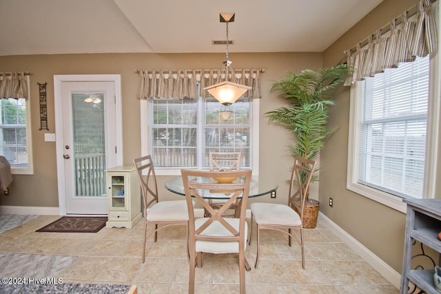 dining area with plenty of natural light