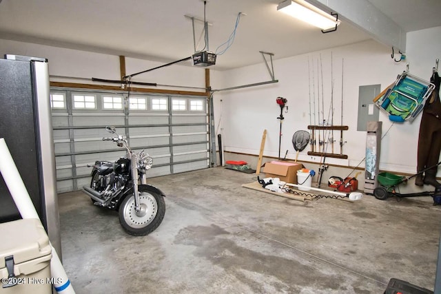 garage featuring electric panel and a garage door opener