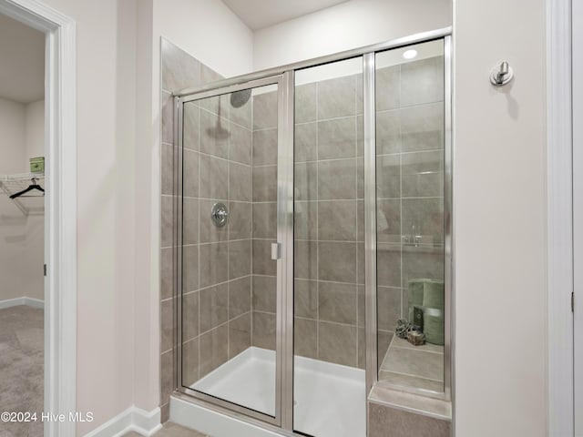 bathroom featuring walk in shower