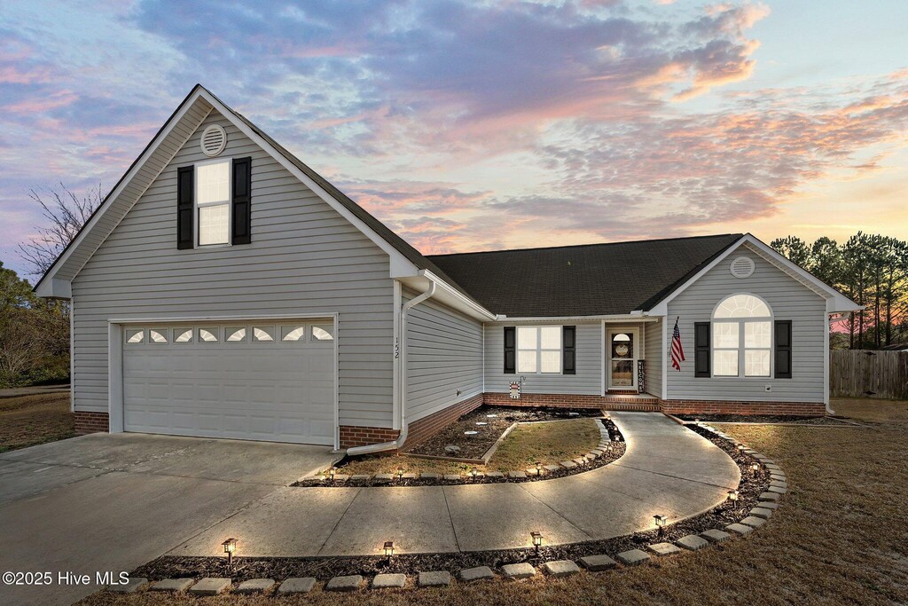 view of front of property featuring a garage