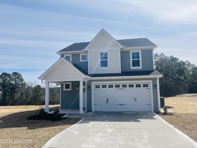 view of front facade featuring a garage, concrete driveway, a shingled roof, and board and batten siding