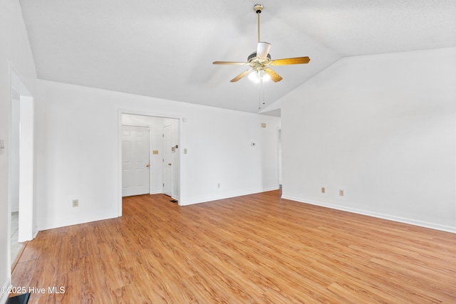 empty room with light hardwood / wood-style floors, ceiling fan, and lofted ceiling