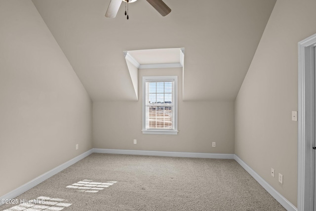 bonus room featuring ceiling fan, carpet, and vaulted ceiling