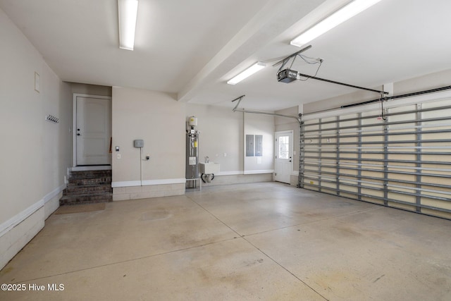 garage featuring electric water heater, electric panel, sink, and a garage door opener