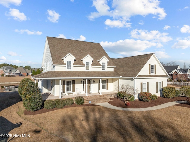 view of front of property featuring covered porch